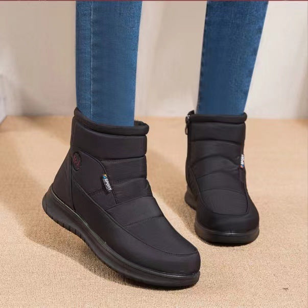 Bottines fourrées femme noires Orthopodys, marque exploitée par AIIBORI (SASU), avec fermeture zippée et bout rond.