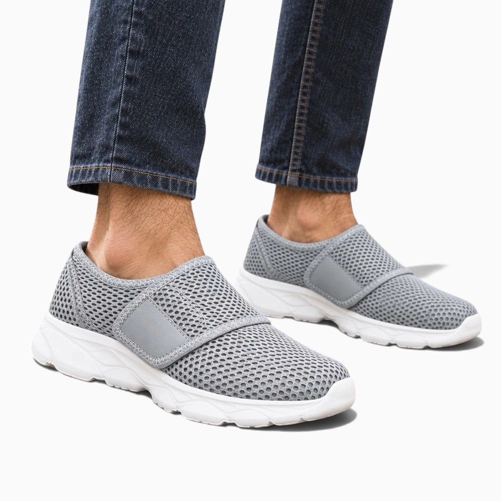 Basket orthopédique homme Orthopodys, marque exploitée par AIIBORI (SASU), en mesh gris extensible avec semelle EVA