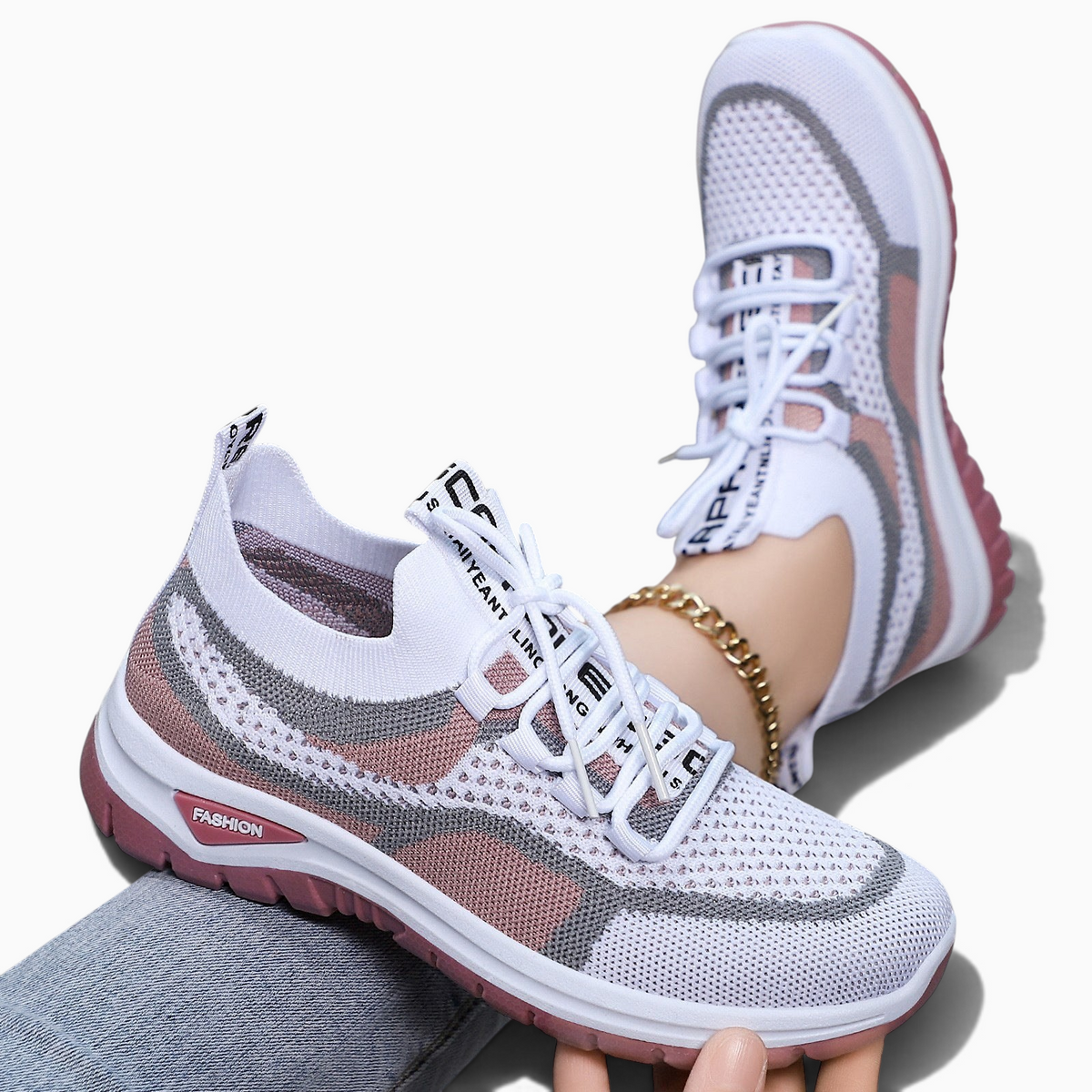 Baskets respirantes femme Orthopodys, marque exploitée par AIIBORI (SASU) en maille blanche et rose avec semelle souple