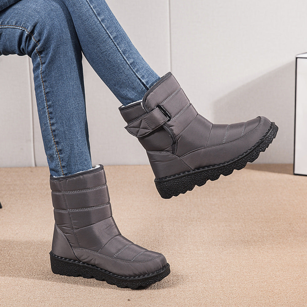 Boots de neige femme grises Orthopodys, marque exploitée par AIIBORI (SASU), avec sangle réglable et semelle épaisse