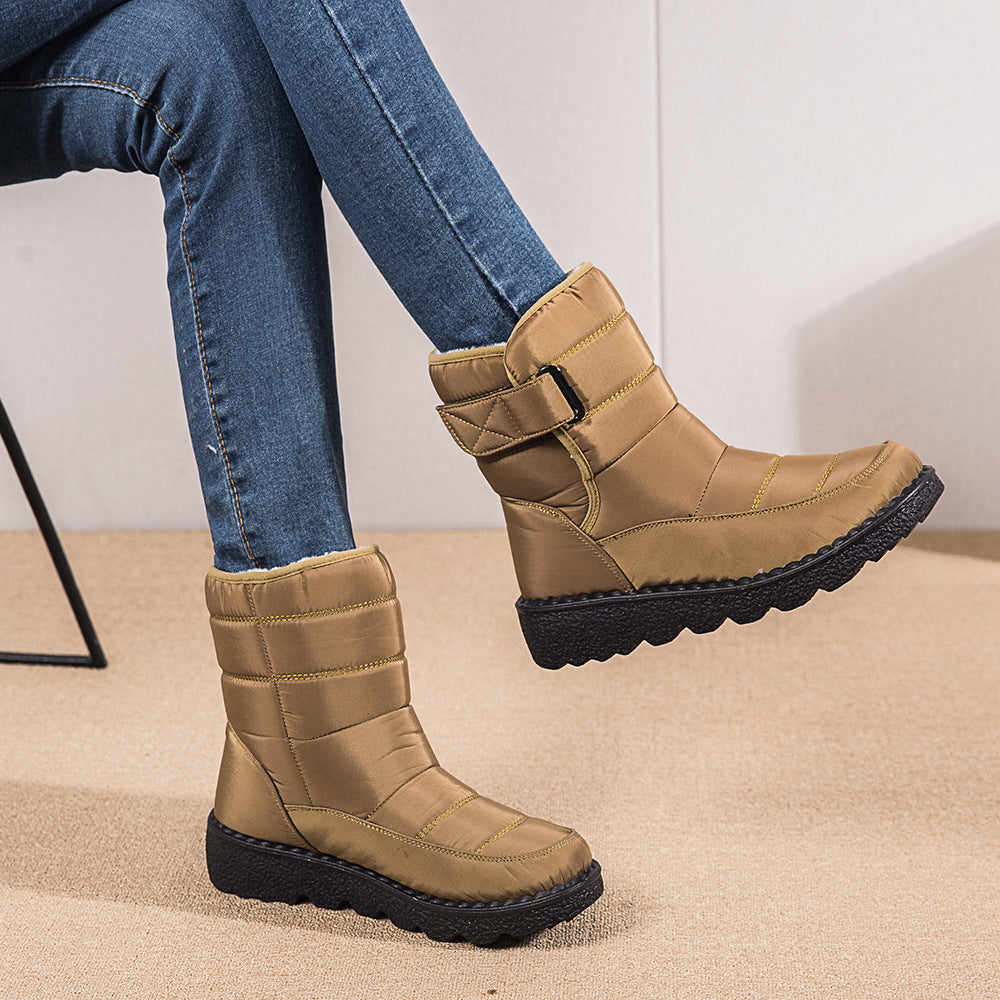 Boots de neige femme Orthopodys, marque exploitée par AIIBORI (SASU), couleur kaki avec sangle réglable et semelle noire