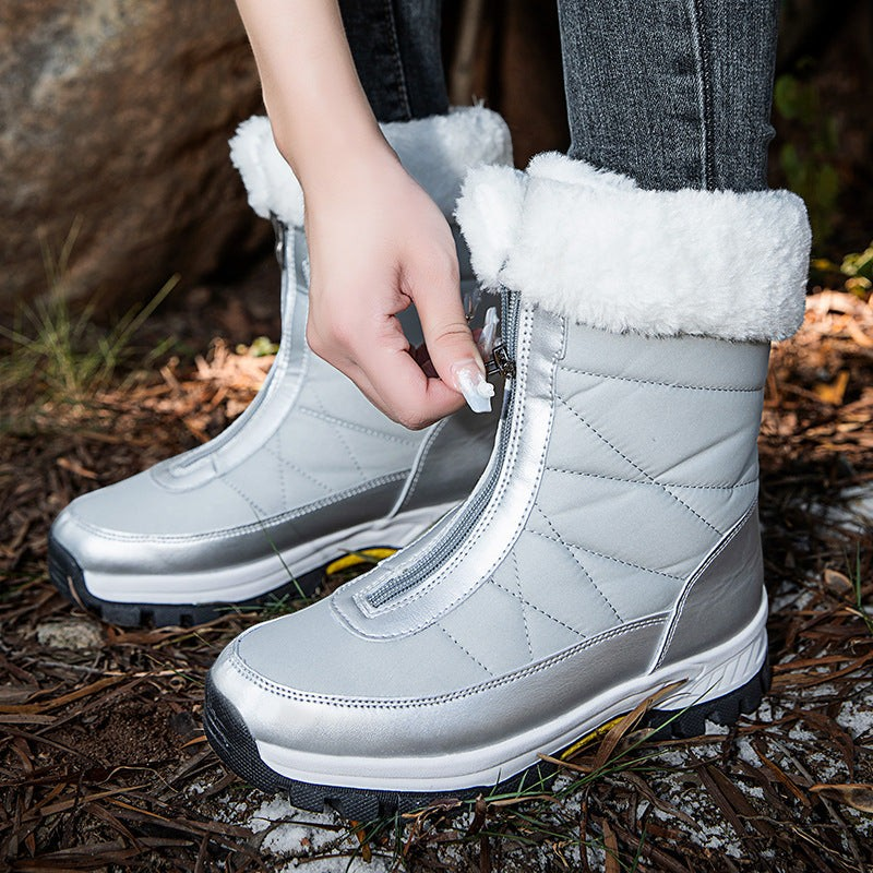 Bottes de neige femme Orthopodys, marque exploitée par AIIBORI (SASU), argentées avec fourrure et fermeture zippée.