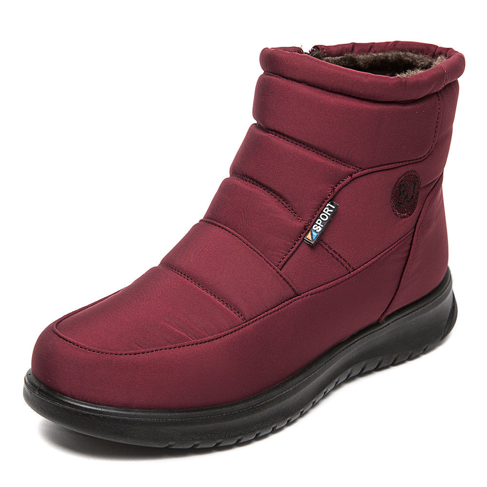 Bottines fourrées imperméables rouges GLACÉVA™ par Orthopodys, marque exploitée par AIIBORI (SASU), avec zip latéral.
