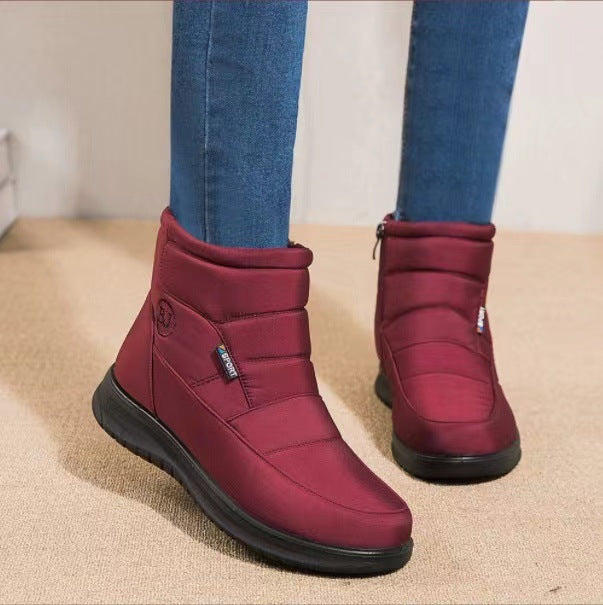 Bottines fourrées femme bordeaux NÉVALYS™ par Orthopodys, marque exploitée par AIIBORI (SASU), avec fermeture zippée.