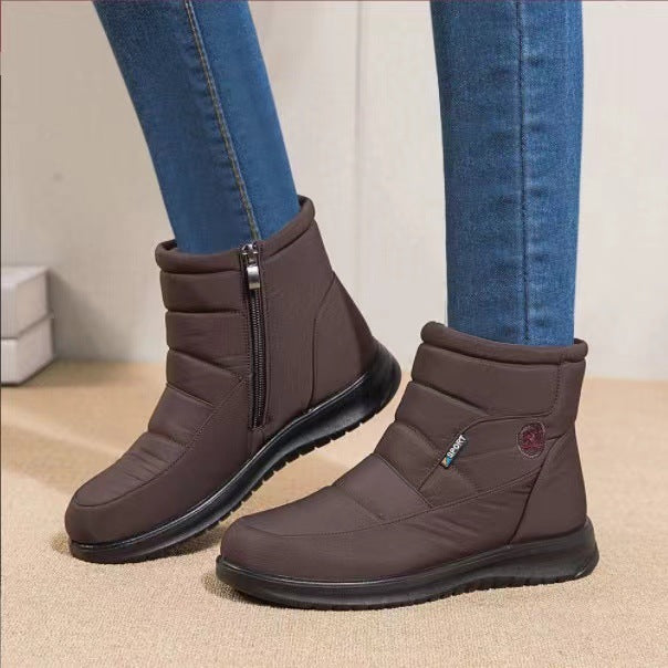 Bottines fourrées marron Orthopodys, marque exploitée par AIIBORI (SASU), avec fermeture zippée et semelle caoutchouc.