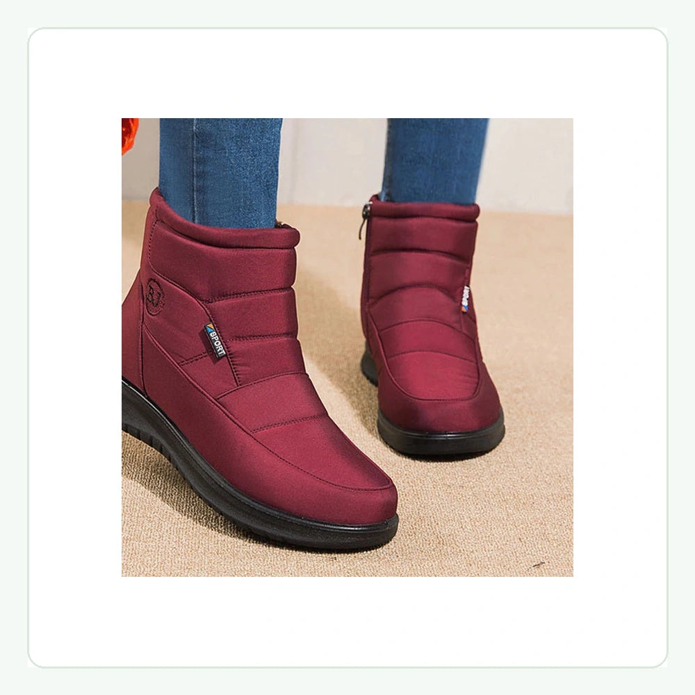 Bottines fourrées imperméables rouges GLACÉVA™ par Orthopodys, marque exploitée par AIIBORI (SASU), avec zip latéral.