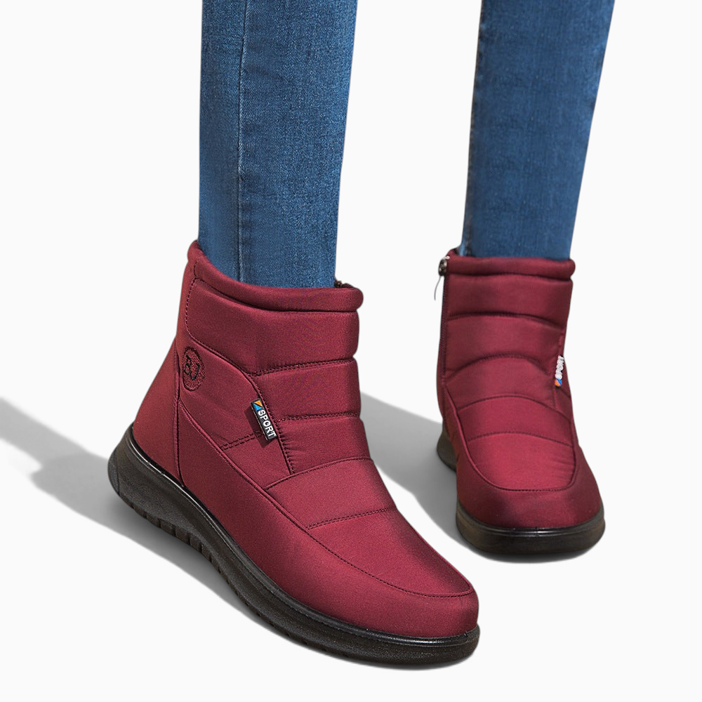 Bottines fourrées imperméables rouges Orthopodys marque exploitée par AIIBORI (SASU) avec zip latéral et tige matelassée
