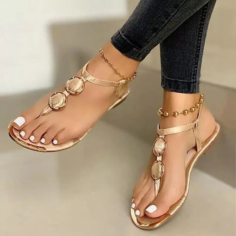 Sandales femme Orthopodys, marque exploitée par AIIBORI (SASU), plates dorées avec médaillons et bride cheville