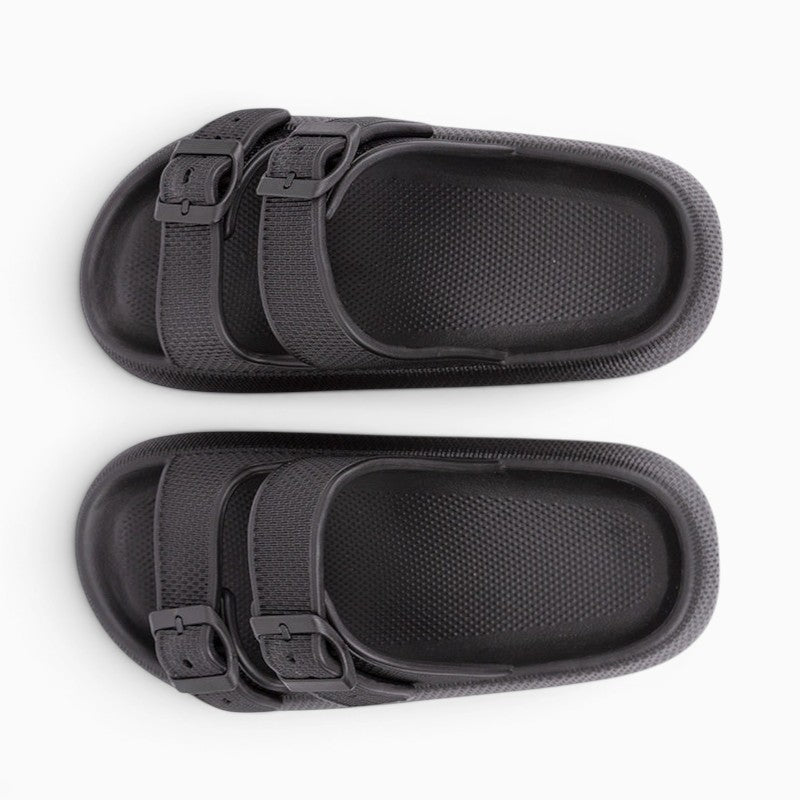 Mules Orthopodys NELYA noires à double bride réglable, semelle plateforme épaisse et confortable pour femme.