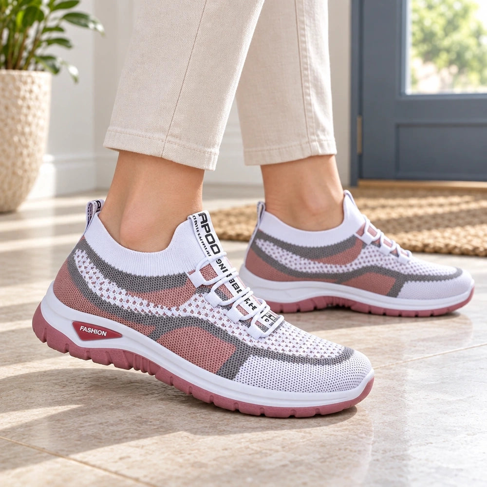 Baskets MISTRIA™ rose et blanc portées, vue rapprochée sur la semelle Image